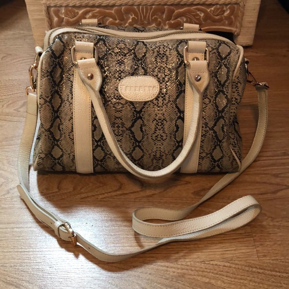 Terzetto leather python print purse.